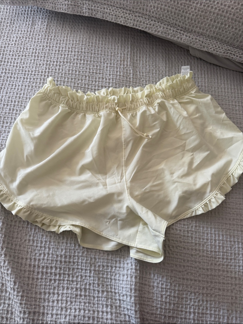 Ruffled Waist Athletic Shorts in a green yellow